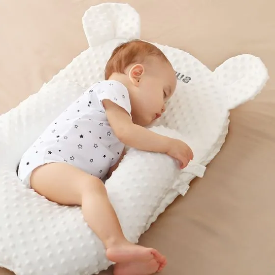 Oreiller de repos et de confort pour nouveau-né : support de sommeil anti-roulement et résistant au reflux